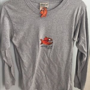 A long sleeve grey shirt